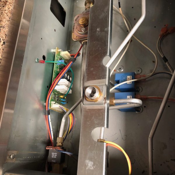 A combination stovetop that needed repair.