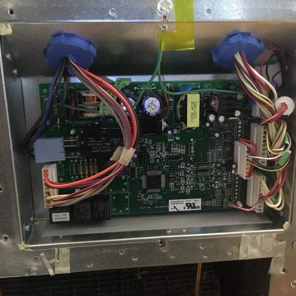 Refrigerator electronic control board that needs repair.